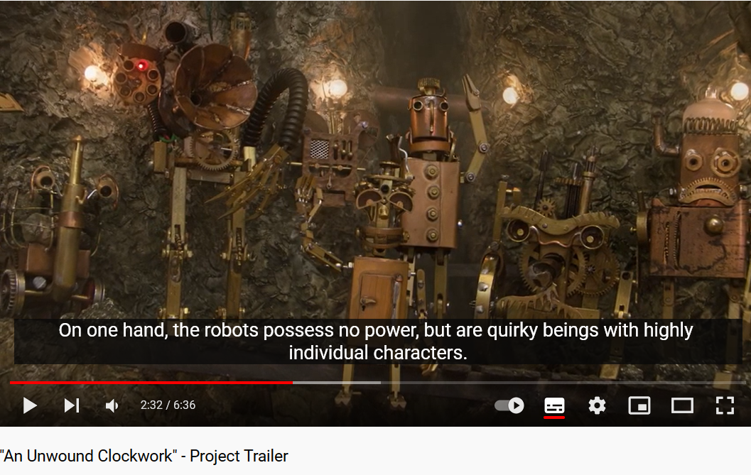 Screenshot aus dem Projekttrailer zu "An Unwound Clockwork", zeigt mehrere mechanische Roboter und den Untertitel "on one hand, the robots possess no power, but are quirky beings with highly individual characters". Ein Klick aufs Bild führt zum Trailer auf YouTube.