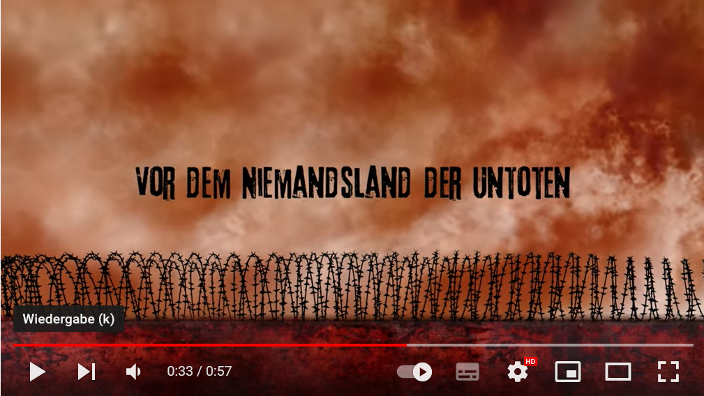 Screenshot aus dem Buchtrailer zu "Lost Land 1". Zeigt einen Stacheldrahtzaun und den Schriftzug "Vor dem Niemandsland der Untoten". Ein Klick auf das Bild führt zu YouTube.