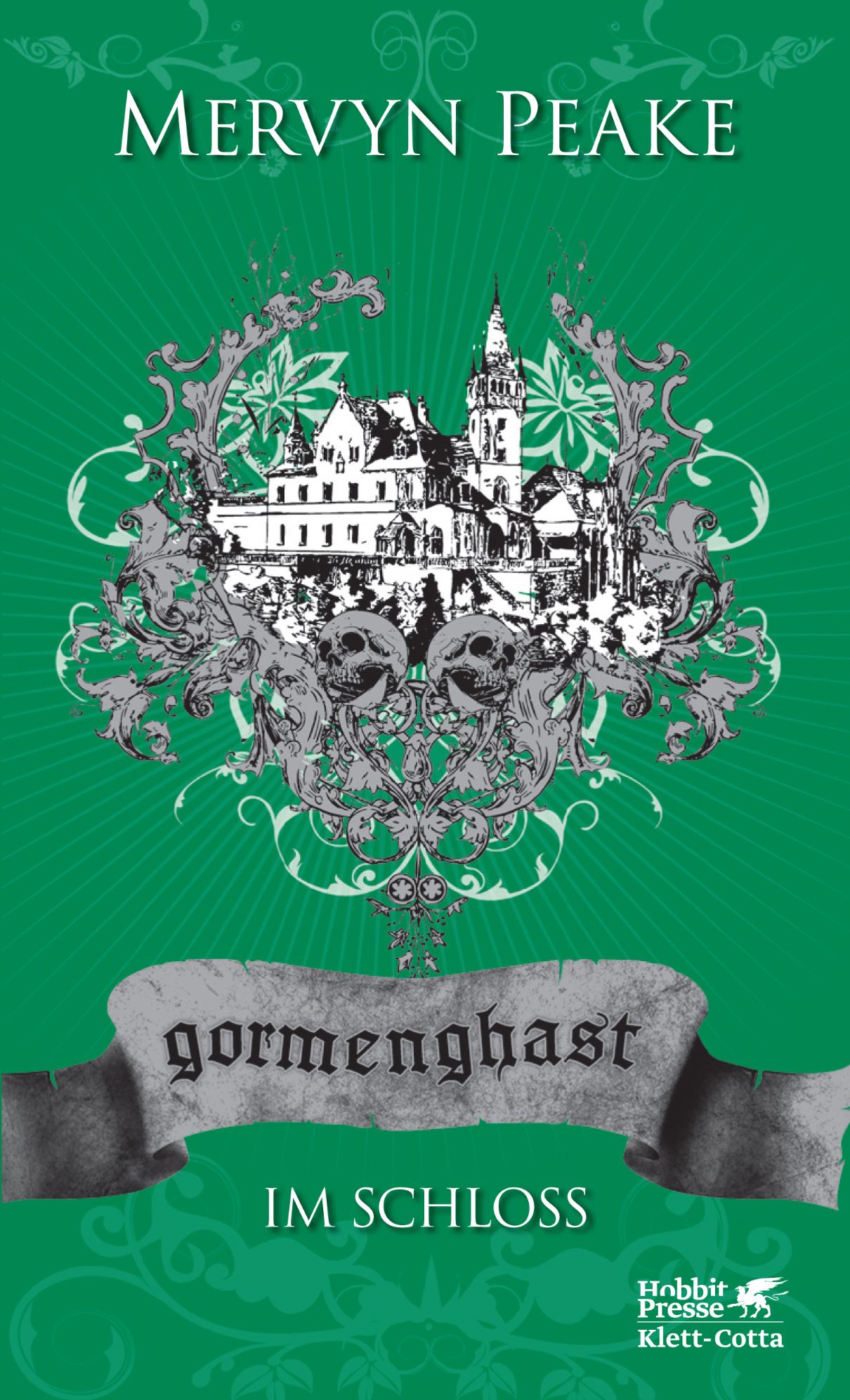 Cover zu "Gormenghast 2: Im Schloss" von Mervyn Peake, Hobbitpresse Klett-Cotta. Grüne Farbe, verschnörkelte Illustration mit Schloss und zwei Totenköpfen.